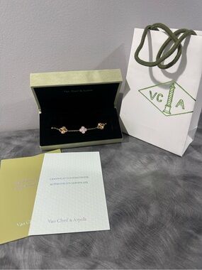 Van Cleef & Arpels Gold Bracelet with Pink Clover Accent